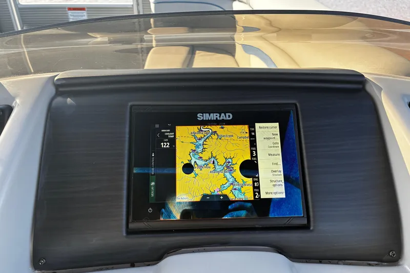 Slide: The Image of Simrad navigation display on 2023 Bennington 22 SSR boat dashboard. - 16