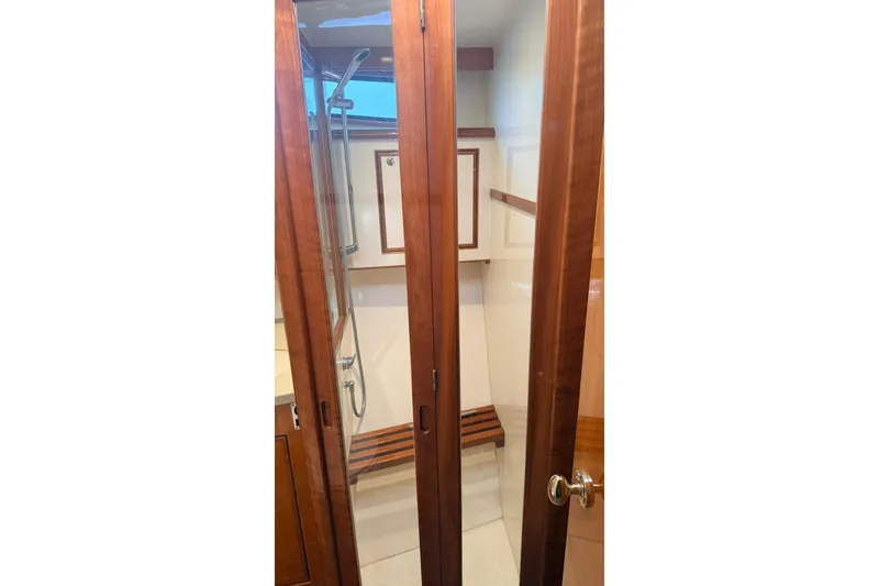 Slide: The Image of Luxurious wooden shower interior on a 2003 Mikelson 50 yacht. - 15