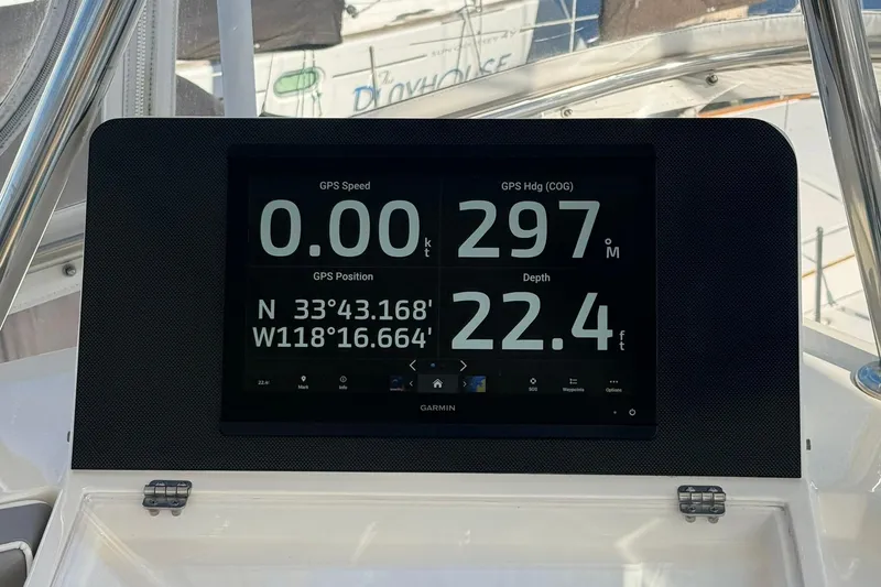 Slide: The Image of Garmin GPS display on 2003 Mikelson 50 yacht showing speed, heading, and depth. - 22