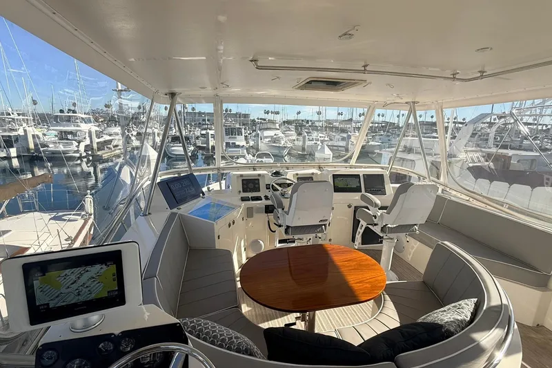 Slide: The Image of Interior view of 2003 Mikelson 50 yacht cockpit with navigation equipment and seating. - 30