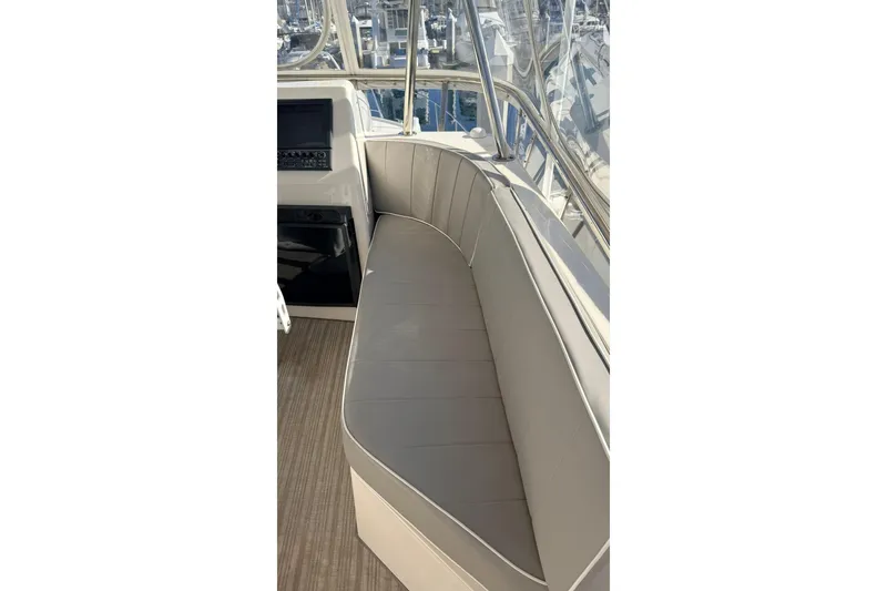 Slide: The Image of Interior seating of 2003 Mikelson 50 yacht with panoramic windows. - 32