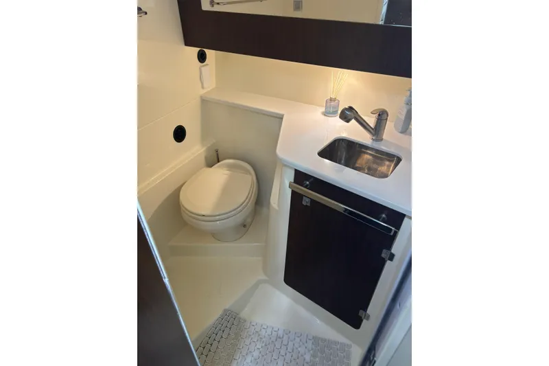 Slide: The Image of 2015 Monterey 360 Sport Coupe bathroom with modern sink and toilet. - 19