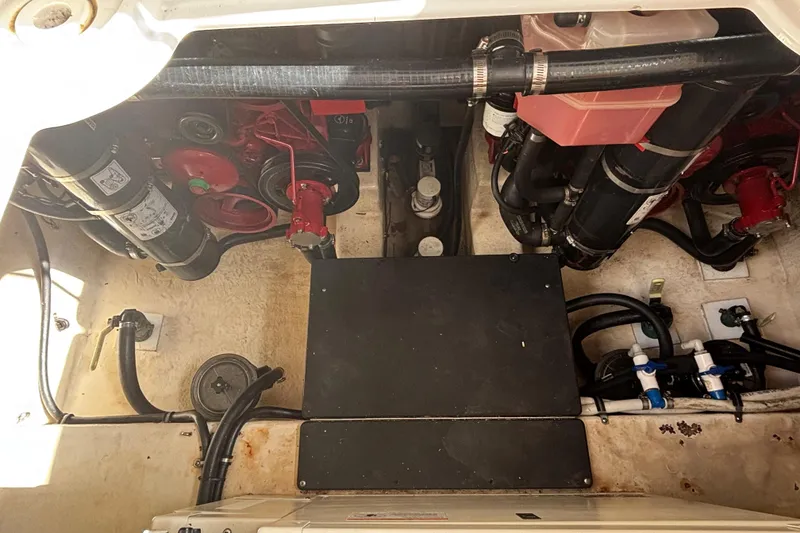 Slide: The Image of Engine compartment of a 2015 Monterey 360 Sport Coupe, showcasing mechanical components and wiring. - 33