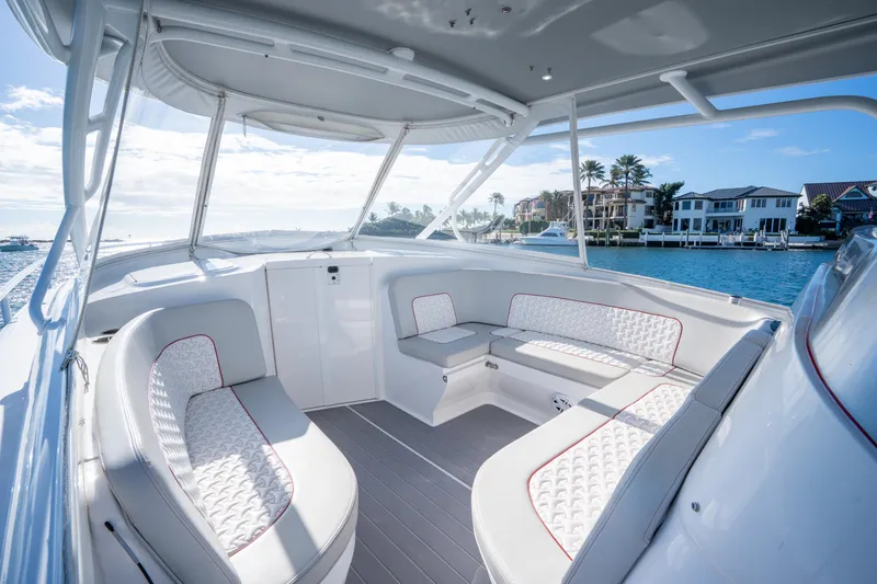 Slide: The Image of Luxurious 2022 Intrepid 409 Valor boat interior with waterfront view. - 11