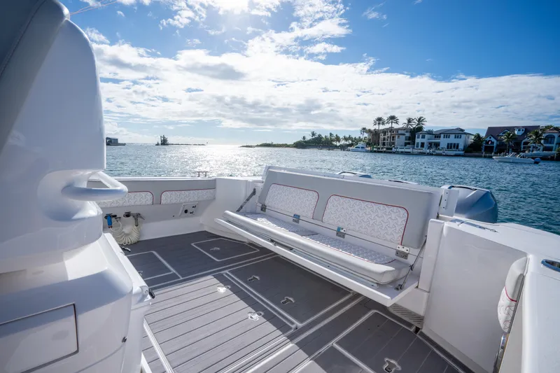 Slide: The Image of 2022 Intrepid 409 Valor boat interior with scenic waterfront view. - 28