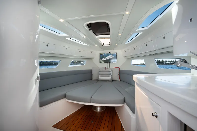 Slide: The Image of Interior of 2022 Intrepid 409 Valor yacht with modern seating and sleek design. - 37