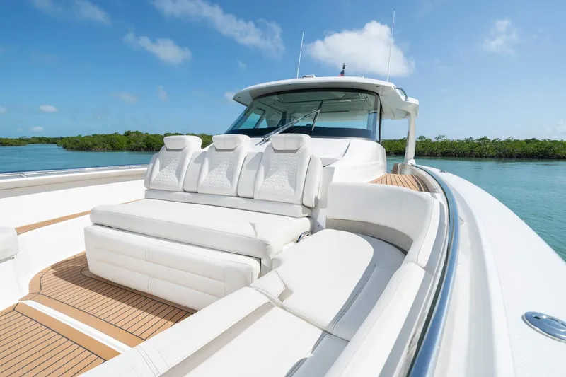 Slide: The Image of Manufacturer Provided Image: 2025 Tiara Yachts 48 LS luxury boat with sleek design and spacious seating. - 9