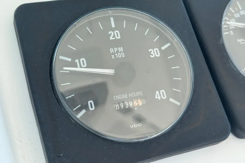 Slide: The Image of Tachometer of 2002 Luhrs 32 Open boat showing RPM and engine hours. - 16