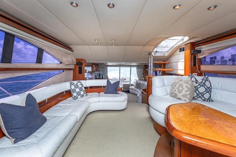 Slide: The Image of Luxurious interior of a 2000 Sunseeker Manhattan 74 yacht with elegant white seating. - 29
