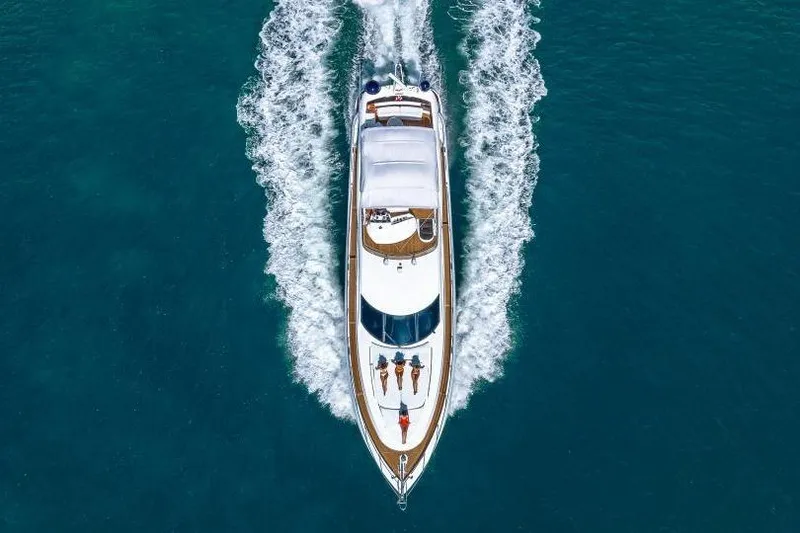 Slide: The Image of Aerial view of 2000 Sunseeker Manhattan 74 yacht cruising on blue ocean waters. - 3