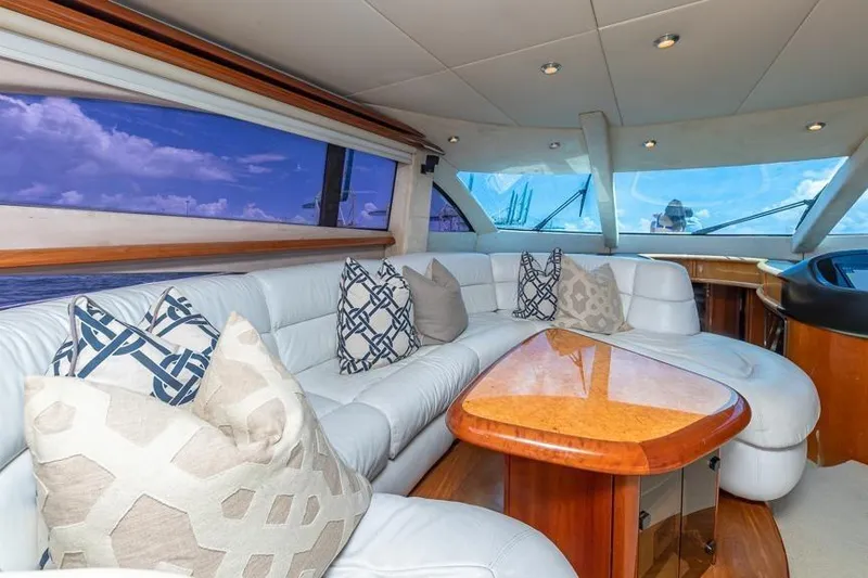 Slide: The Image of Luxurious interior of 2000 Sunseeker Manhattan 74 yacht with plush seating and elegant decor. - 30