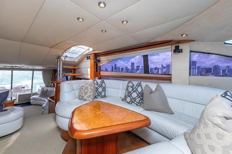 Slide: The Image of Luxurious interior of 2000 Sunseeker Manhattan 74 yacht with city skyline view. - 32