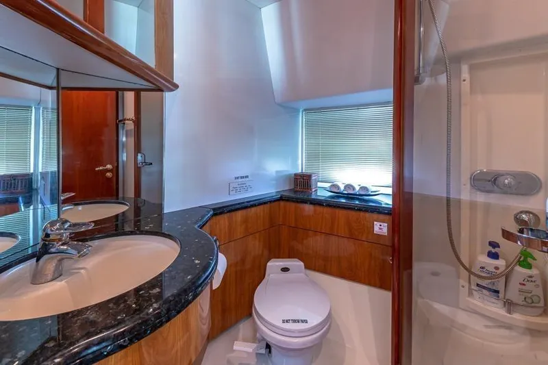 Slide: The Image of Luxurious bathroom in 2000 Sunseeker Manhattan 74 yacht with modern fixtures and elegant design. - 39