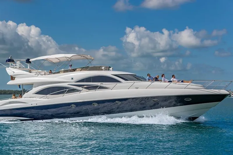 Slide: The Image of Luxury Sunseeker Manhattan 74 yacht cruising on blue ocean, 2000 model. - 7