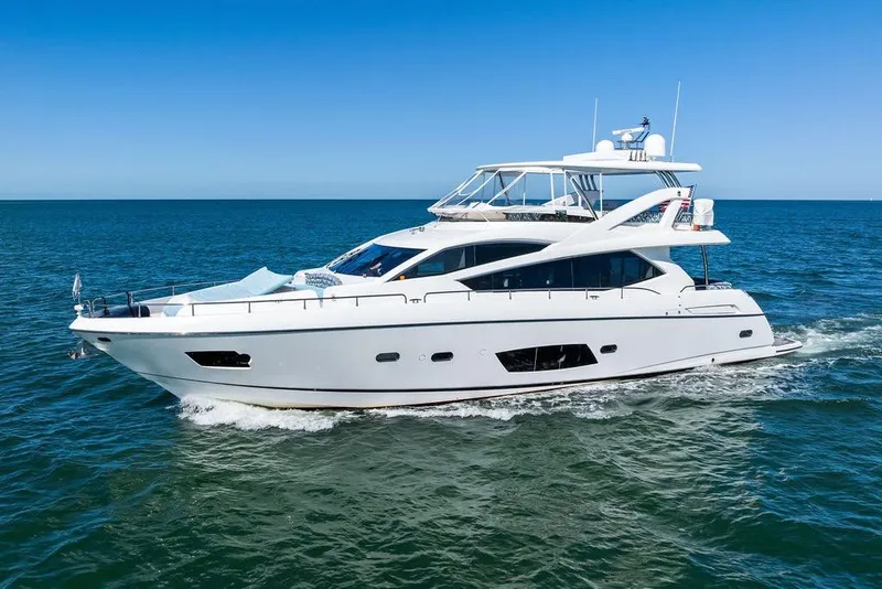 The Image of Luxurious 2013 Sunseeker Manhattan 73 yacht cruising on open sea. - 0