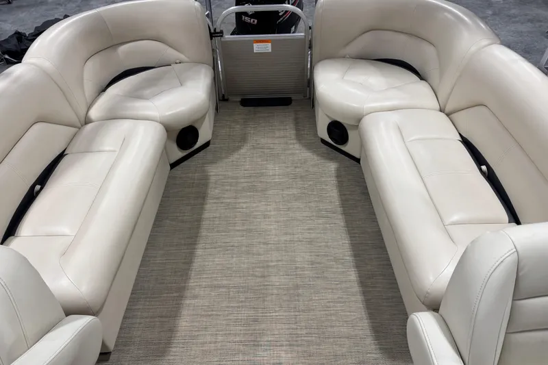 Slide: The Image of Luxurious interior of 2018 Landau Atlantis 250 pontoon boat with plush seating. - 12