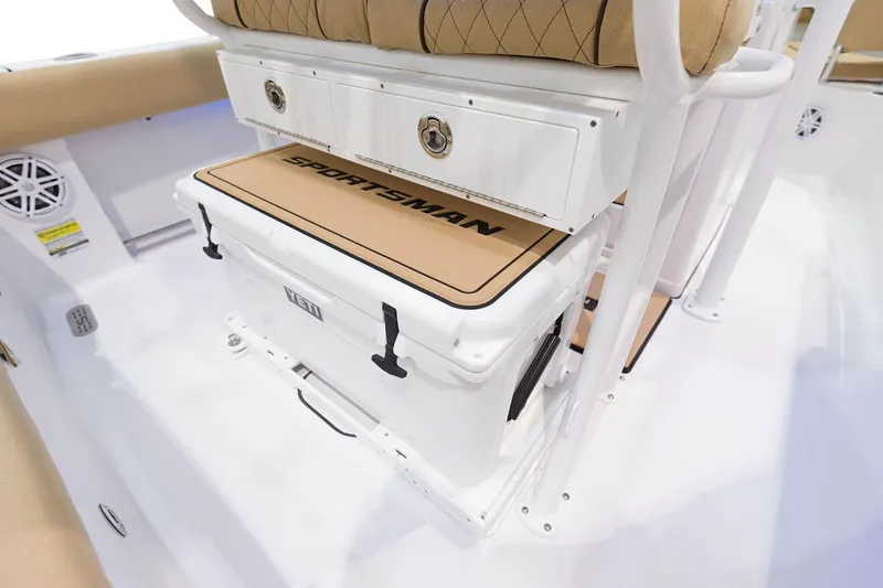 Slide: The Image of Manufacturer Provided Image: 2021 Sportsman Heritage 211 Center Console boat interior with cooler and storage. - 11