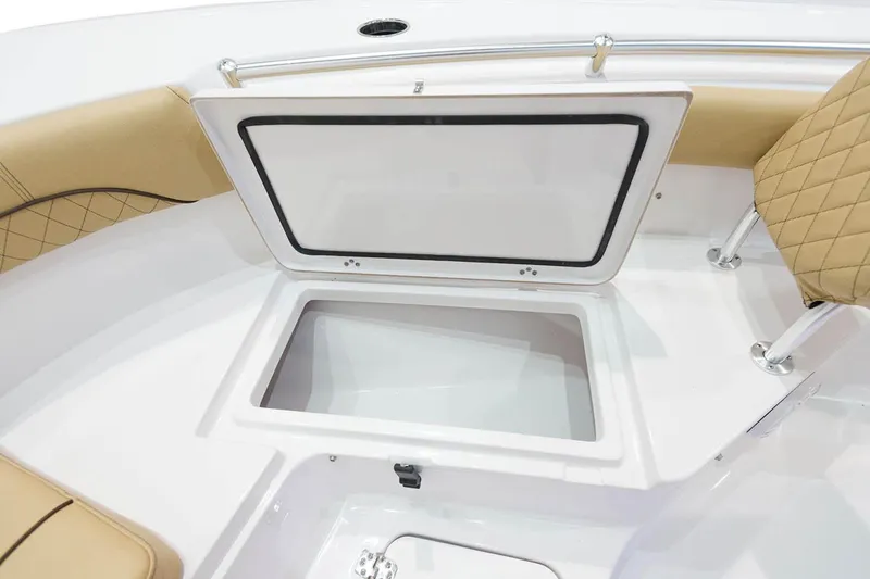 Slide: The Image of Manufacturer Provided Image: 2021 Sportsman Heritage 211 Center Console storage compartment. - 15