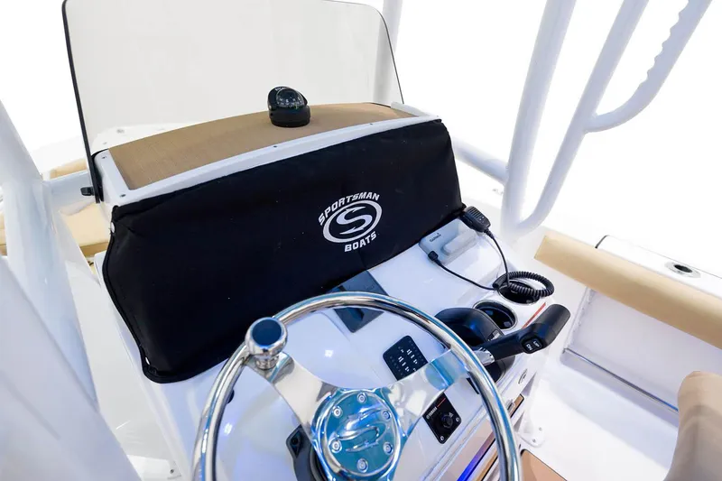 Slide: The Image of Manufacturer Provided Image: 2021 Sportsman Heritage 211 Center Console boat dashboard and steering wheel. - 6