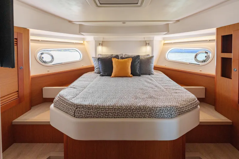 Slide: The Image of Interior of 2025 Beneteau Swift Trawler 41 Fly with cozy seating and ocean view. - 28