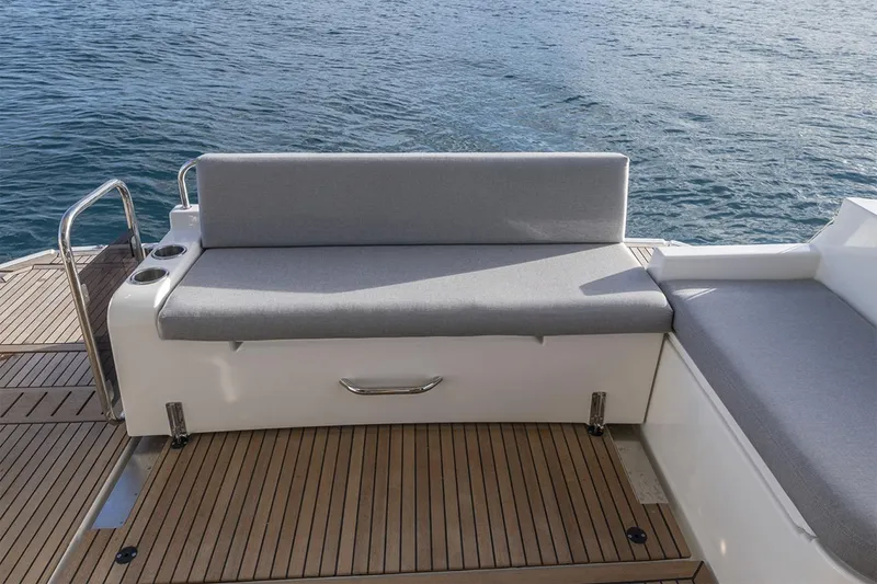 Slide: The Image of Aerial view of 2025 Beneteau Swift Trawler 41 Fly cruising on open water. - 8