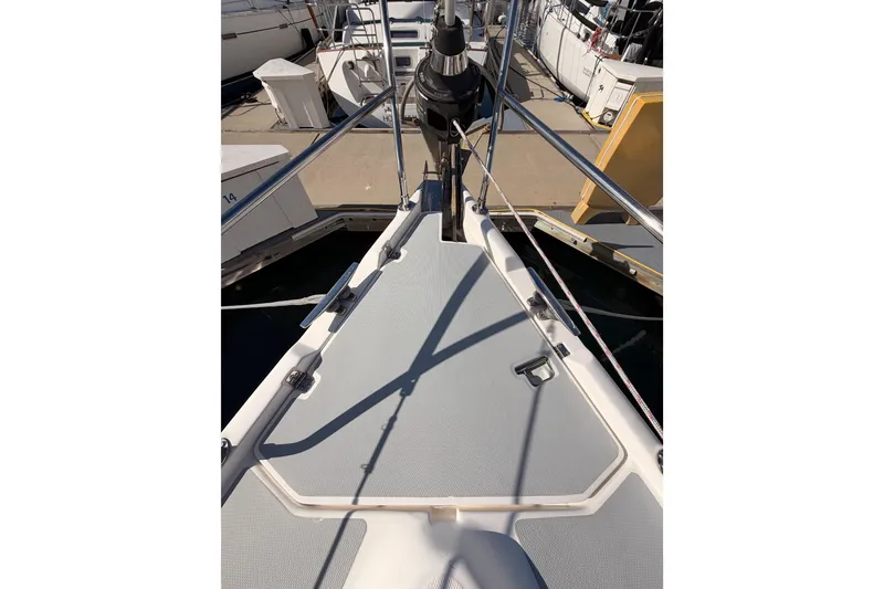 Slide: The Image of Bow view of 2004 Hunter Passage 420 sailboat docked at marina. - 17