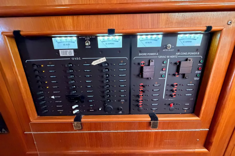 Slide: The Image of Electrical control panel on a 2004 Hunter Passage 420 yacht. - 61