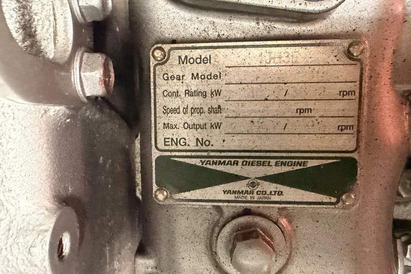 Slide: The Image of Yanmar diesel engine plate on 2004 Hunter Passage 420 sailboat. - 88