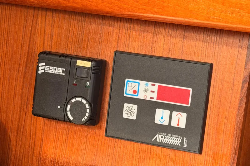 Slide: The Image of Espar heater and Marine Air Systems controls on 2004 Hunter Passage 420 yacht. - 94