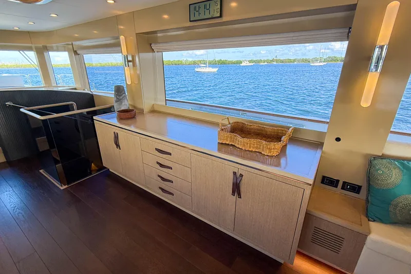 Slide: The Image of Luxurious interior of 2023 Sirena 68 yacht with ocean view and elegant furnishings. - 32
