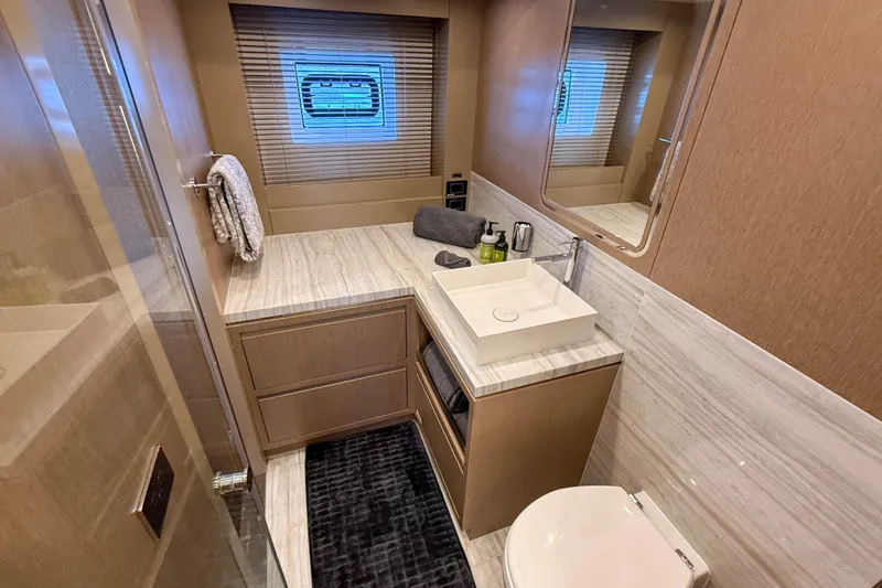 Slide: The Image of Luxurious bathroom interior of 2023 Sirena 68 yacht with modern fixtures and elegant design. - 45