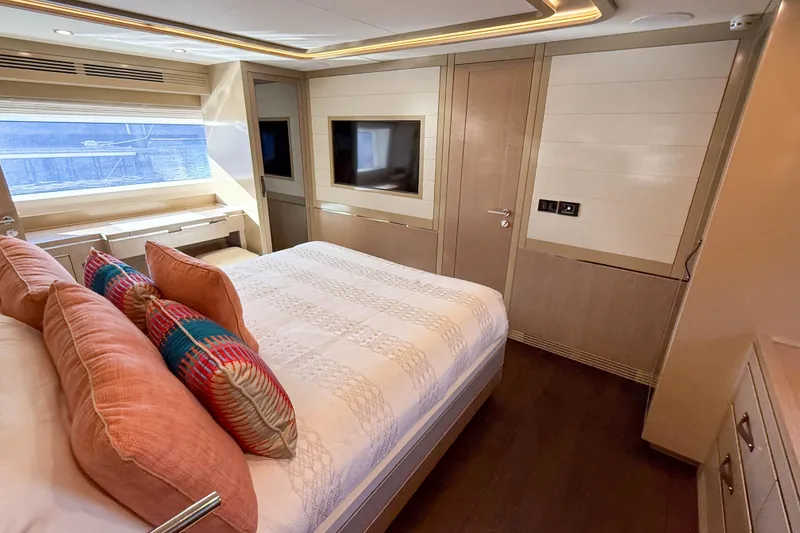 Slide: The Image of Luxurious bedroom interior of 2023 Sirena 68 yacht with elegant decor and large windows. - 47