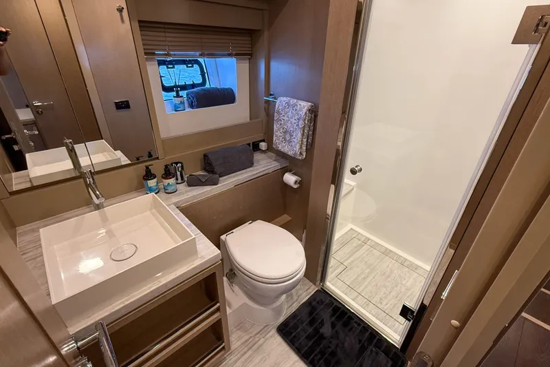 Slide: The Image of Luxurious bathroom in 2023 Sirena 68 yacht with modern fixtures and elegant design. - 51