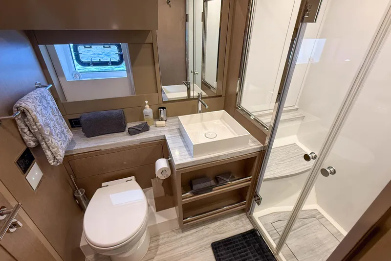 Slide: The Image of Luxurious bathroom in 2023 Sirena 68 yacht with modern fixtures and elegant design. - 55