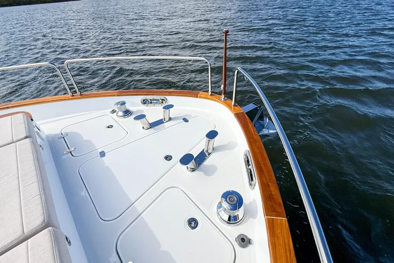 Slide: The Image of Luxurious 2023 Sirena 68 yacht deck with polished fittings and scenic water view. - 63