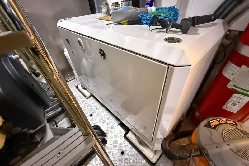 Slide: The Image of Engine room of 2023 Sirena 68 yacht with equipment and tools. - 71
