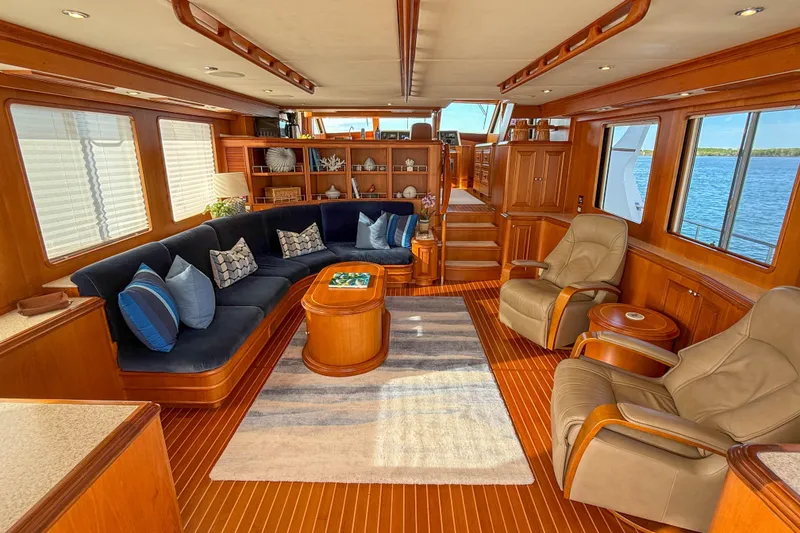 Slide: The Image of Luxurious interior of 2003 Grand Banks 64 Aleutian RP yacht with leather chairs and ocean view. - 10