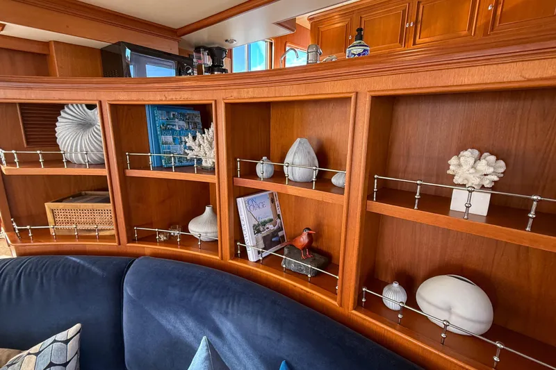 Slide: The Image of Luxurious 2003 Grand Banks 64 Aleutian RP yacht interior with elegant wood finishes and modern navigation. - 14