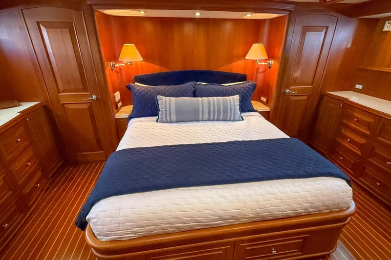 Slide: The Image of Luxurious cabin interior of 2003 Grand Banks 64 Aleutian RP yacht with elegant wood finish. - 44