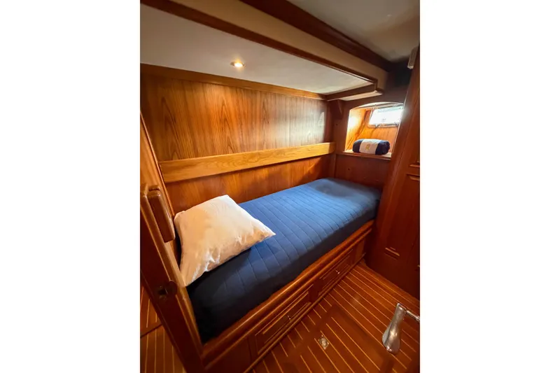 Slide: The Image of Luxurious 2003 Grand Banks 64 Aleutian RP yacht bathroom with elegant wood and granite finishes. - 61