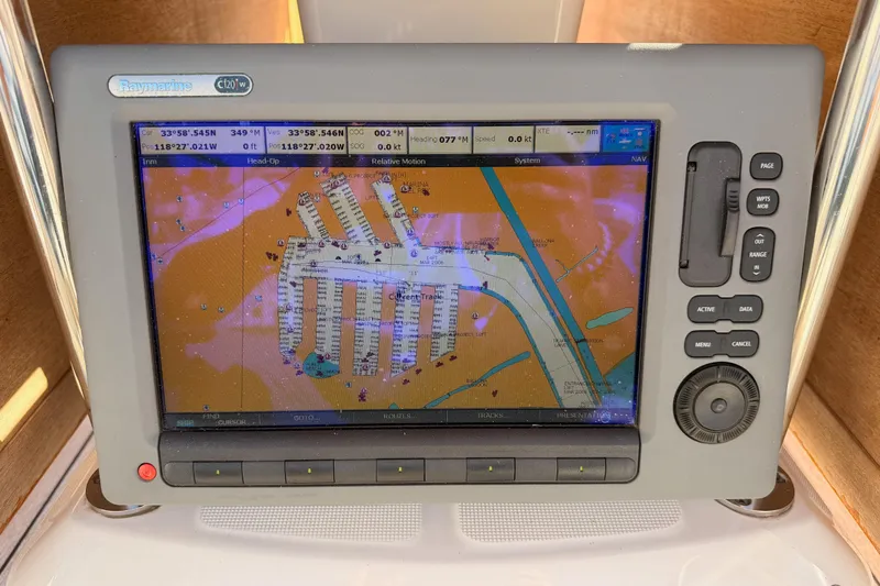 Slide: The Image of Raymarine c120w navigation display on 2011 Jeanneau 53 sailboat, showing marina map. - 26