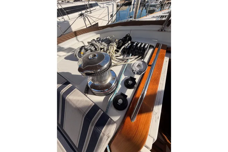 Slide: The Image of Deck of 2011 Jeanneau 53 sailboat with winch and ropes. - 39