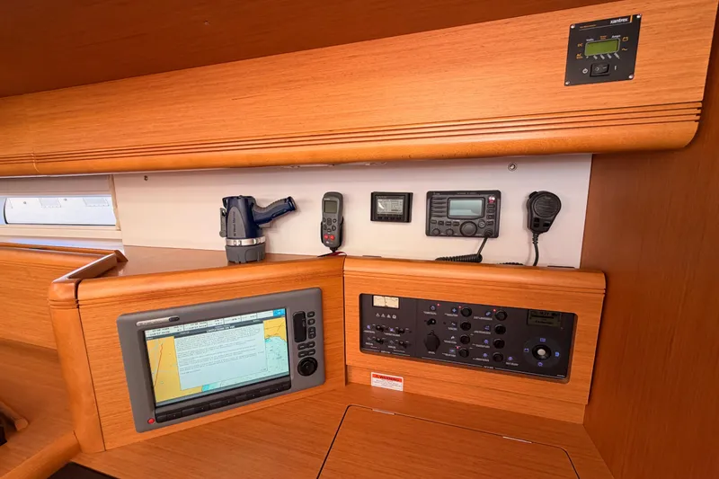 Slide: The Image of Interior of 2011 Jeanneau 53 yacht with navigation and communication equipment. - 62