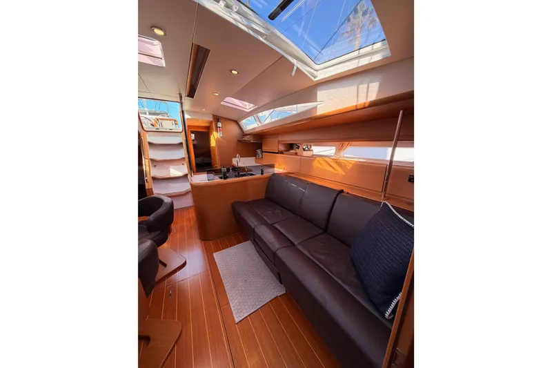 Slide: The Image of Interior of 2011 Jeanneau 53 yacht with modern design and skylights. - 81