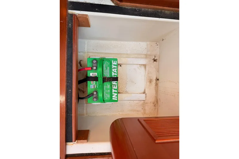 Slide: The Image of Battery compartment of a 2007 Beneteau 49 sailboat with Interstate battery. - 104
