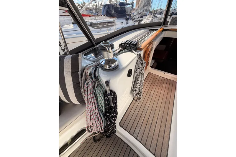 Slide: The Image of Interior view of 2007 Beneteau 49 sailboat cockpit with ropes and winch. - 41