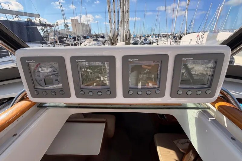 Slide: The Image of Control panel of a 2007 Beneteau 49 yacht with Raymarine displays. - 43