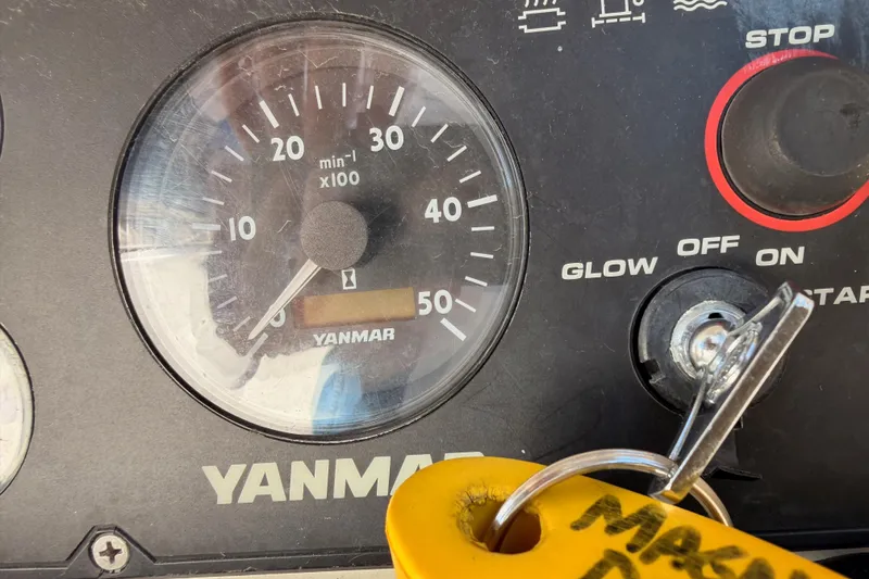 Slide: The Image of Yanmar engine control panel on a 2007 Beneteau 49 sailboat. - 47