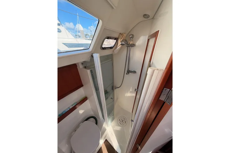 Slide: The Image of Bathroom interior of 2007 Beneteau 49 yacht with shower and toilet. - 65