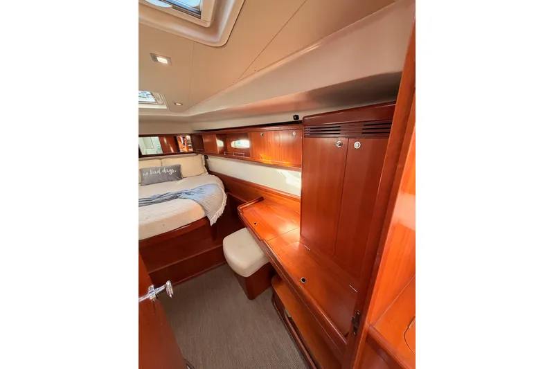 Slide: The Image of Luxurious cabin interior of 2007 Beneteau 49 yacht with wooden furnishings. - 84